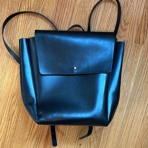 Auxiliary leather backpack